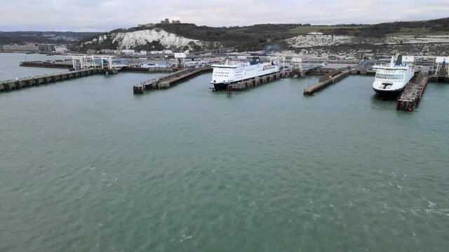 Ferrys ships waiting docked at Port of Dover ,Ferry terminal Kent England ,aerial drone 4k footage