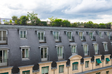 Paris, typical building with a large roof terrace, aerial view in a luxurious area
