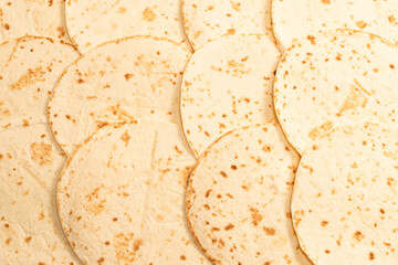 Grilled pitta bread isolated on white background.