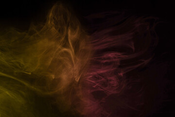 Yellow and pink steam on a black background.