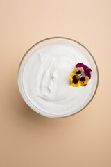 Bowl of white plain yogurt set for breakfast