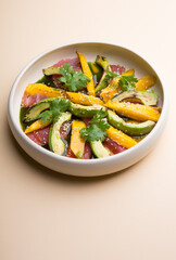 Grilled tuna salad with mango and avocado