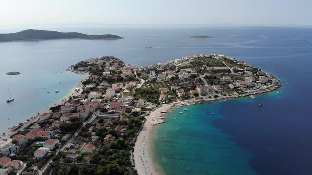 Aerial Sevid peninsula in the morning, backwards.
