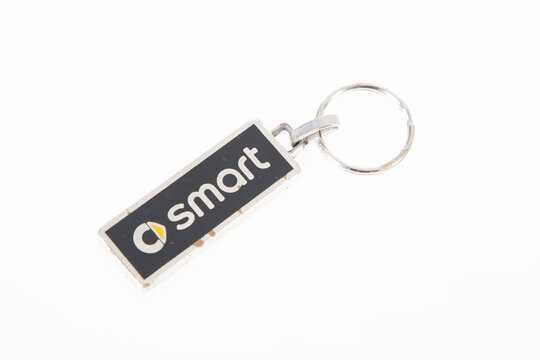 Smart car logo brand dealership sign text on key chain German automotive division store of mercedes benz