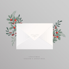 Christmas season's greetings template. Classic envelope with winter botanical decoration, flowers and greenery, xmas plants and berries