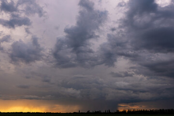 Obraz na płótnie Canvas stormy clouds and torrential rain with dramatic sky
