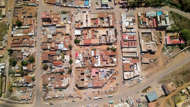 Top down view of slums in a small African town - drone slowly rising up