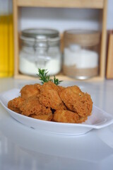 a plate of crispy fried tofu