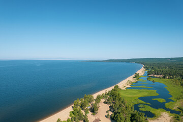 Summertime imagery of Lake Baikal is a rift lake located in southern Siberia, Russia. Baikal lake summer landscape view. Drone's Eye View.