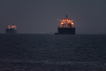 Ships with their lights on at night