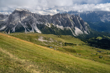 Fototapeta na wymiar Hiking path and epic landscape of Seceda peak in Dolomites Alps, Odle mountain range, South Tyrol, Italy, Europe