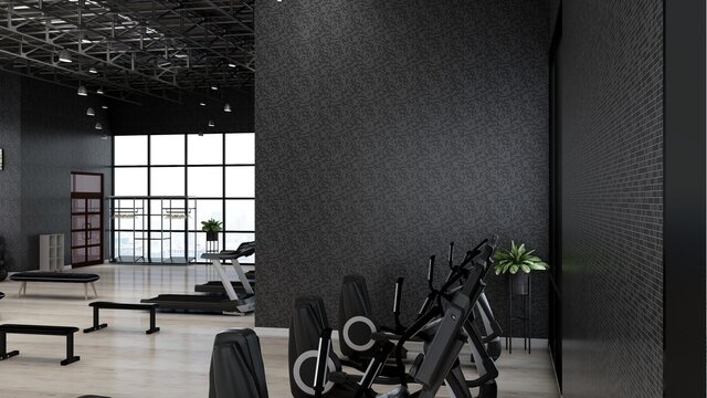 A black blank wall in modern gym interior with wooden floor