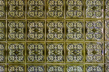 Old vintage ceramic tiles for the decoration stoves and fireplaces. Background, texture