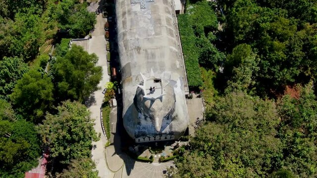 Church building formed like chicken, aerial top down view