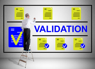 Validation concept drawn by a man on a ladder