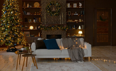 Modern interior of a Christmas living room with a beautiful sofa decorated with a Christmas tree,...