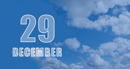 december 29. 29-th day of the month, calendar date.White numbers against a blue sky with clouds. Copy space, winter month, day of the year concept