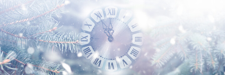 New Year celebration banner with retro dial clock with snow, fir branches and sun light. Countdown...