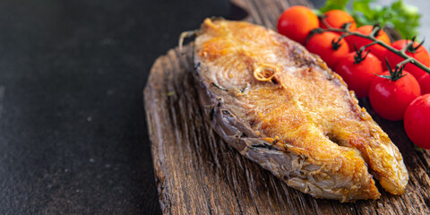 fried fish seafood steak meal snack on the table copy space food background rustic. top view keto or paleo diet vegetarian food no meat pescetarian diet