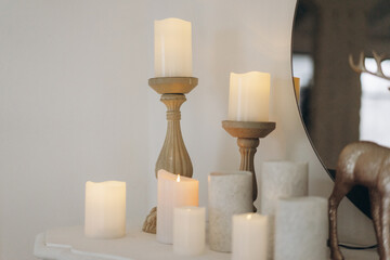 electric candles of different sizes, romantic setting
