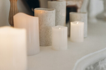 electric candles of different sizes, romantic setting
