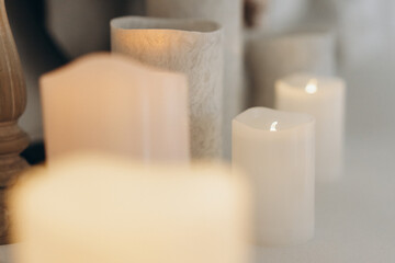 electric candles of different sizes, romantic setting