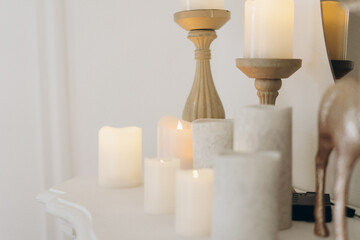 electric candles of different sizes, romantic setting