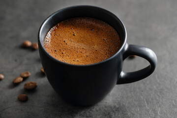 Steaming coffee espresso in cup