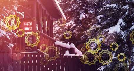 Image of stars falling over winter scenery at christmas