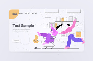 man pushing woman in trolley cart big sale promotion shopping concept horizontal