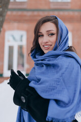 beautiful girl, dark hair, winter, walking around the city, black coat