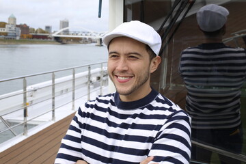 Fashionable ethnic man in luxurious yacht