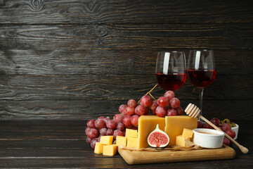 Concept of cooking eating with hard cheese on dark table