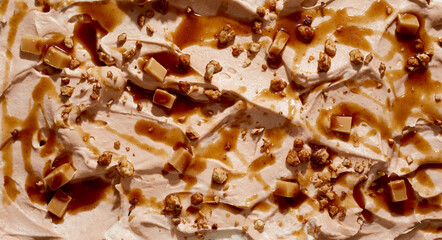 Gourmet caramel ice cream with walnuts and candy