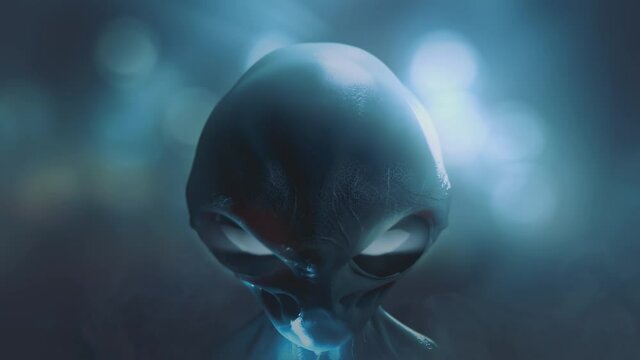 Alien with big eyes slowly rising his head and looking straight into the camera. Defocused bokeh background. Science fiction cinematic video.