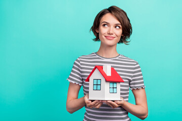 Photo of young attractive girl happy positive smile house dream relocation loan isolated over teal...