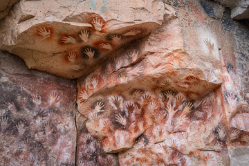 Ancient rock art at the Cave of the Hands (Spanish: Cueva de Las Manos ) in Santa Cruz Province,...