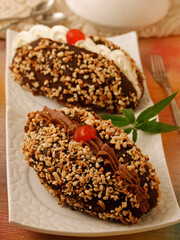 Pastry filled with chocolate, cream and almonds.