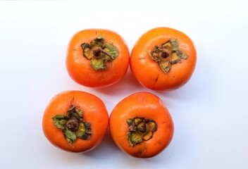 Persimmon fruit isolated on white background. Orange fresh ripe persimmon. Set of persimmons. Collection.
