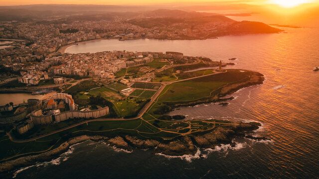 La coruna aerial of the city in Galicia north Spain, sunset golden hour view of the harbor and the old town city center from above