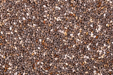 Chia seeds background. Healthy superfood. Closeup macro of small organic chia seeds.