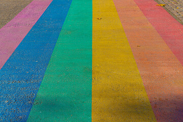 Worldwide LGBTQ community concept, Rainbow pedestrian crosswalk, Colourful colored crossroad, Old...