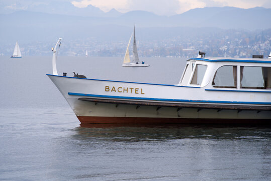 Passenger ship named Bachtel on lake Zürich on a cloudy autumn day. Photo taken October 30th, 2021, Zurich, Switzerland.