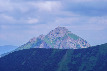 Fototapeta na wymiar misty mountain tops in Slovenia national park
