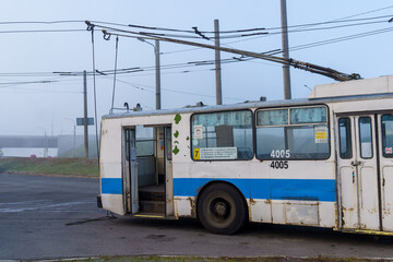 The trolleybus  in the fog