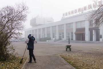 The river port building in fog. Barnaul, Siberia.