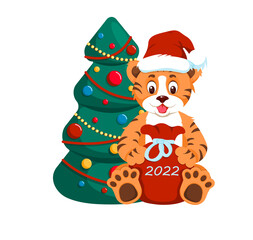 A cute tiger in a Santa Claus hat holds a bag with gifts in its paws. Behind a tiger cub is a Christmas tree with balls. Isolated on a white background. Flat style. Christmas. Vector illustration.