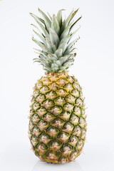 Ripe whole pineapple isolated on white background, clipping path