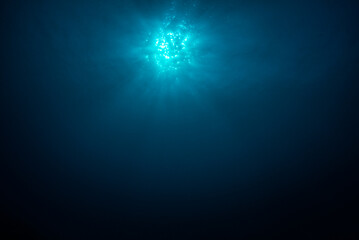 Sun with rays look from underwater