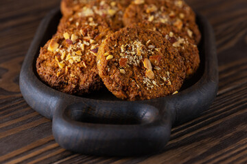 Quinoa cookies on a wooden board. Sugar, gluten and lactose free and vegan.